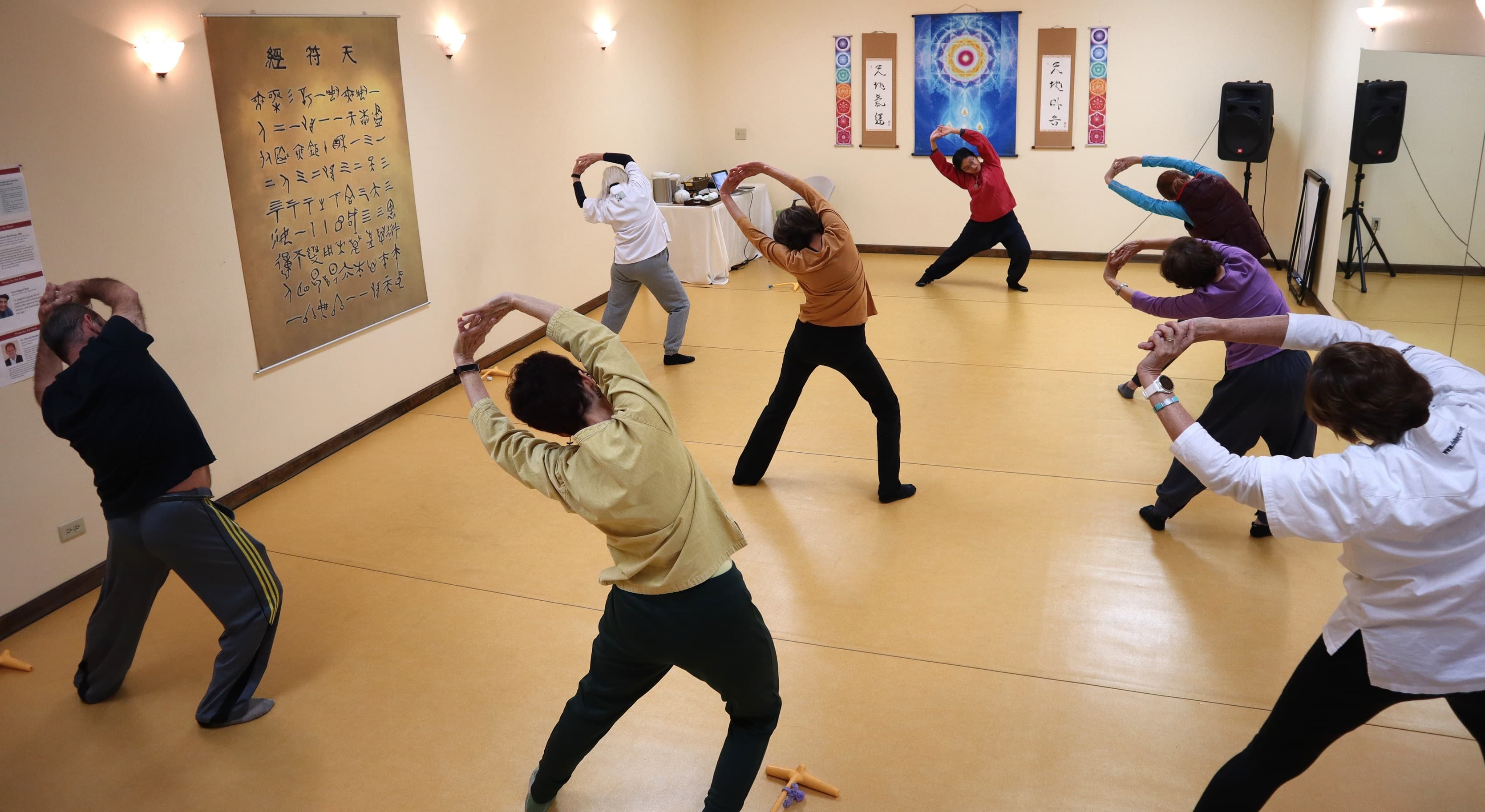 People stretching before an outdoor fitness meetup